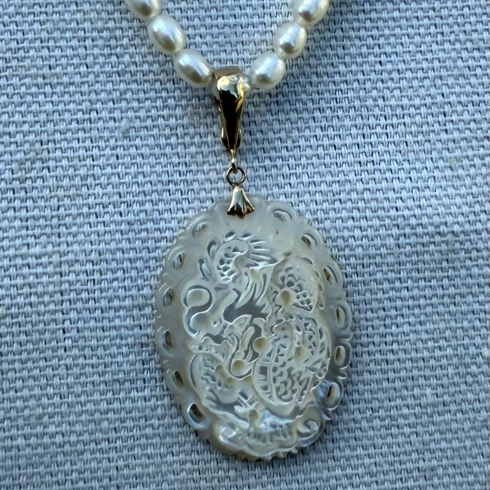 Elegant Pearl and Silver Dragon Pendant Necklace